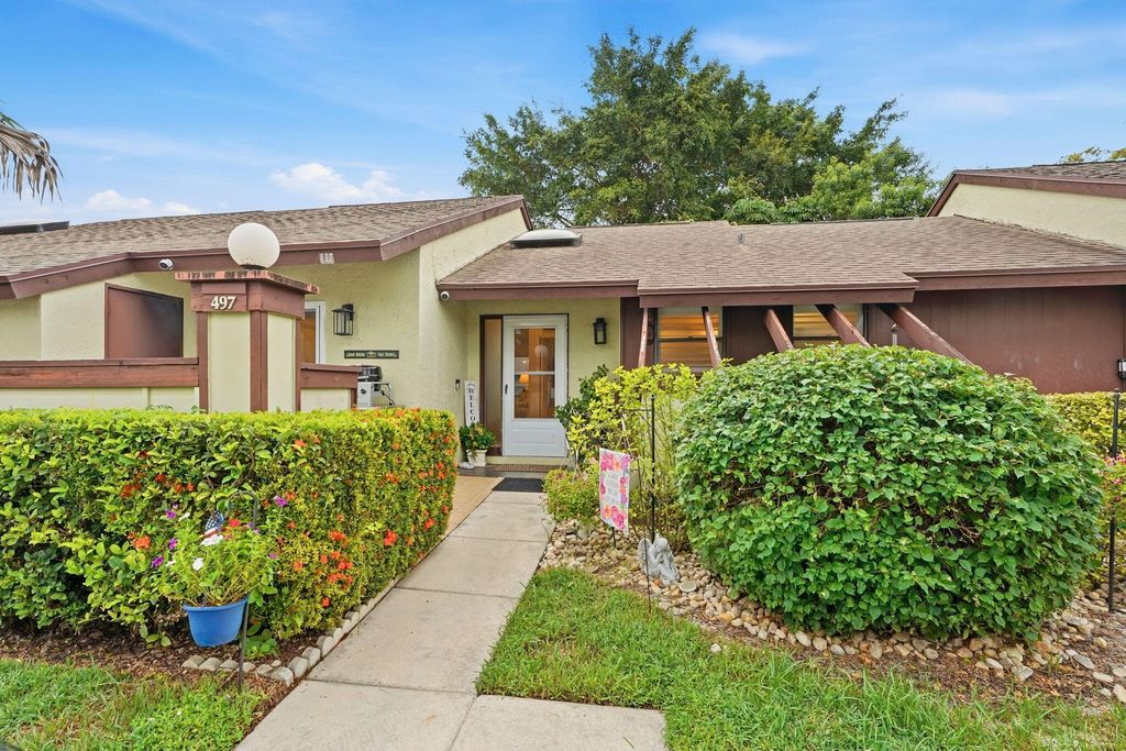 497 Iron Forge Court, Royal Palm Beach, FL 33411