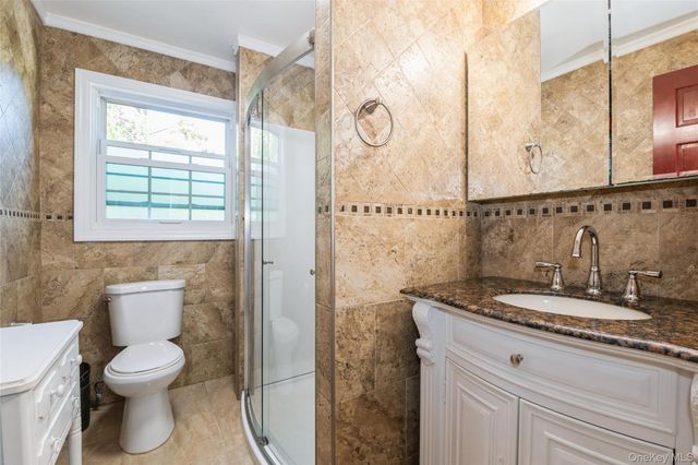 82-27 Utopia Parkway, Jamaica Estates, NY 11432