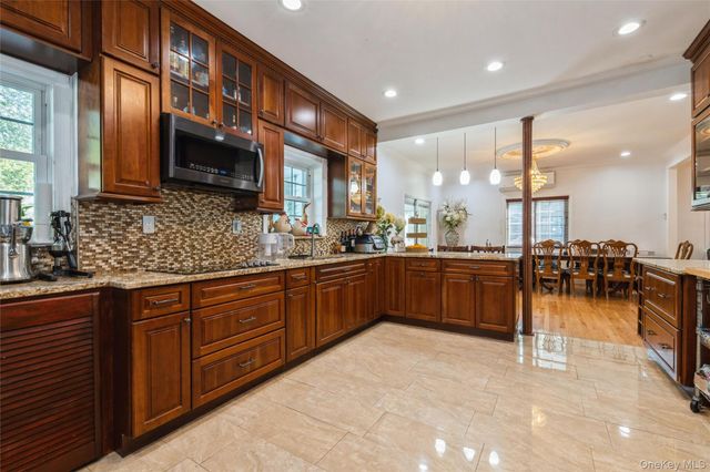 82-27 Utopia Parkway, Jamaica Estates, NY 11432