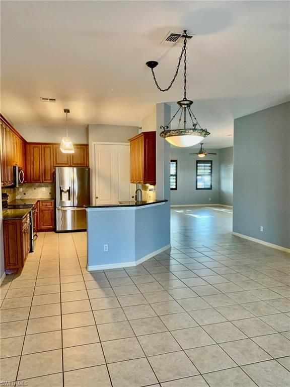 Image 15 of property listing at 3023 Lake Manatee CT, Cape Coral, FL 33909