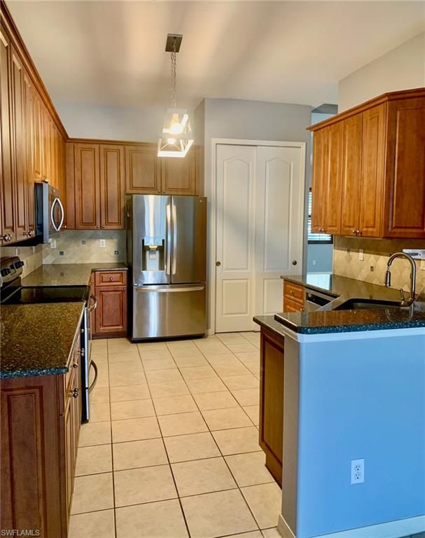 Image 8 of property listing at 3023 Lake Manatee CT, Cape Coral, FL 33909