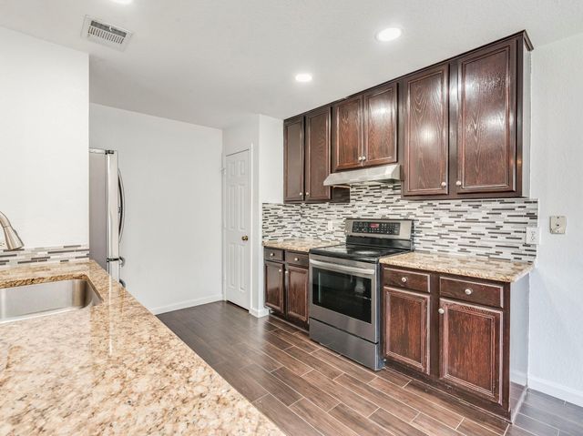 12825 Sexson Ridge CV, Del Valle, TX 78617