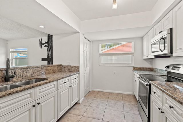 7021 BLOSSOM AVENUE, Tampa, FL 33614