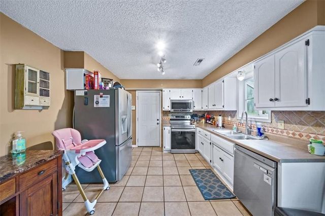 409 Autumn Court, Belton, MO 64012