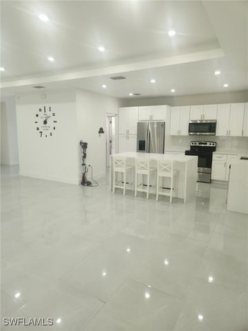 521 Frank Jewett AVE S, Lehigh Acres, FL 33974