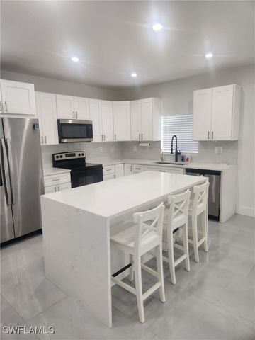 521 Frank Jewett AVE S, Lehigh Acres, FL 33974