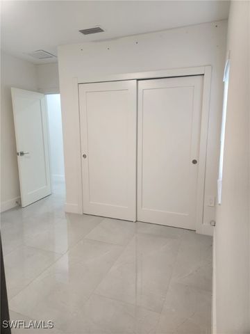 521 Frank Jewett AVE S, Lehigh Acres, FL 33974