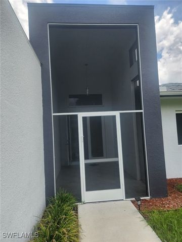 521 Frank Jewett AVE S, Lehigh Acres, FL 33974