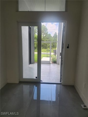 521 Frank Jewett AVE S, Lehigh Acres, FL 33974