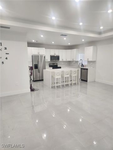 521 Frank Jewett AVE S, Lehigh Acres, FL 33974