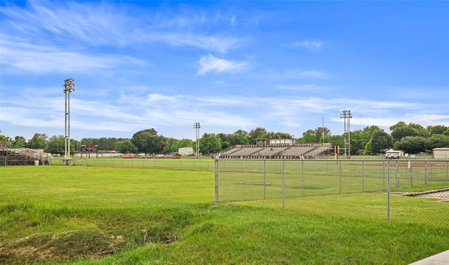 931 Tarkington Timbers Drive, Cleveland, TX 77327