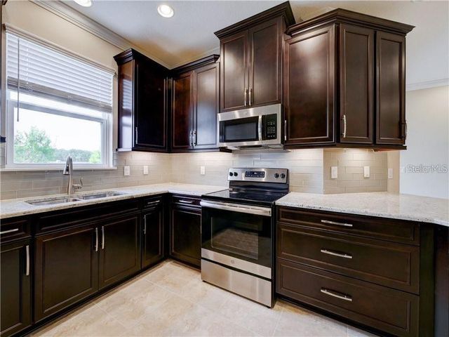 1074 AMBER LEAF TRAIL, Wesley Chapel, FL 33544