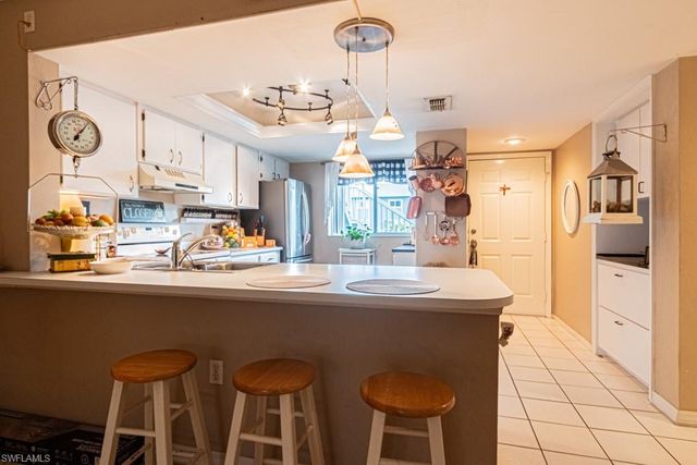 130 Cypress WAY E 1, Naples, FL 34110