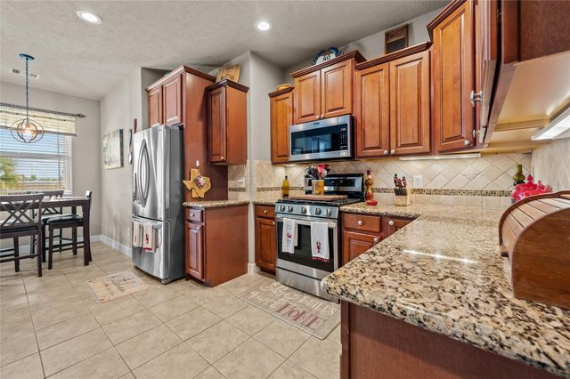 9723 Suffolk Downs Drive, Mont Belvieu, TX 77523