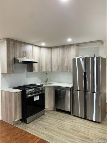 9108 77th Street, Woodhaven, NY 11421