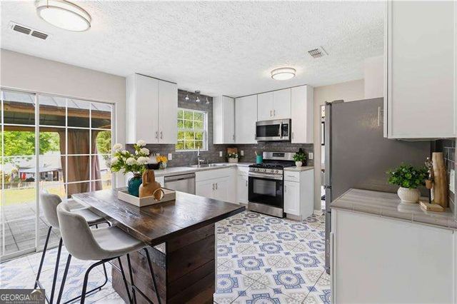 405 Plantation Way, Woodstock, GA 30188