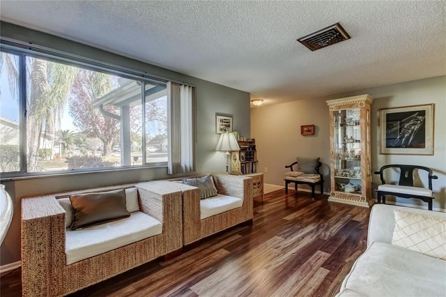 8210 WOODSONG ROW, Hudson, FL 34667