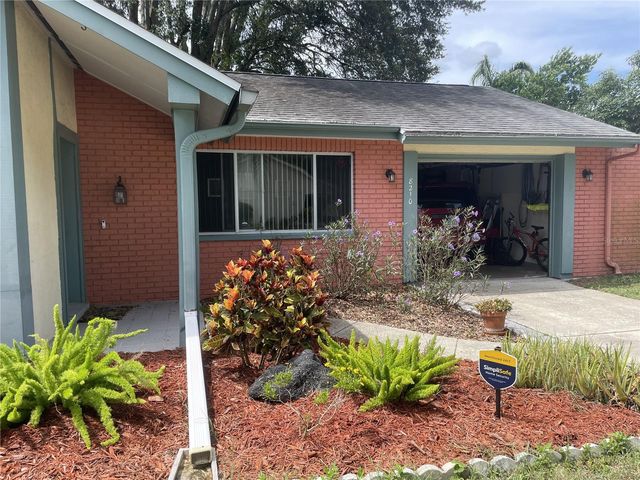 8210 WOODSONG ROW, Hudson, FL 34667