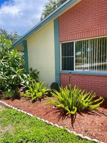 8210 WOODSONG ROW, Hudson, FL 34667