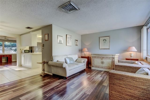 8210 WOODSONG ROW, Hudson, FL 34667