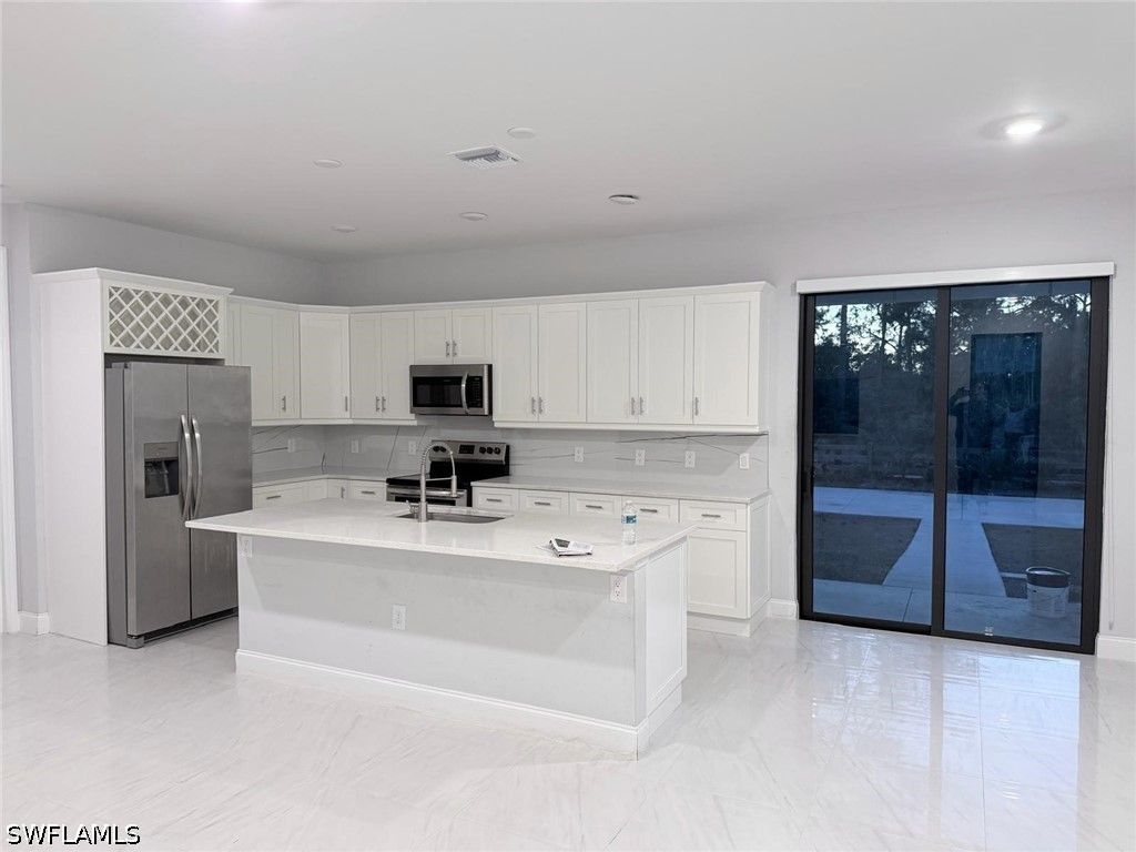 912 Ossie AVE, Lehigh Acres, FL 33974