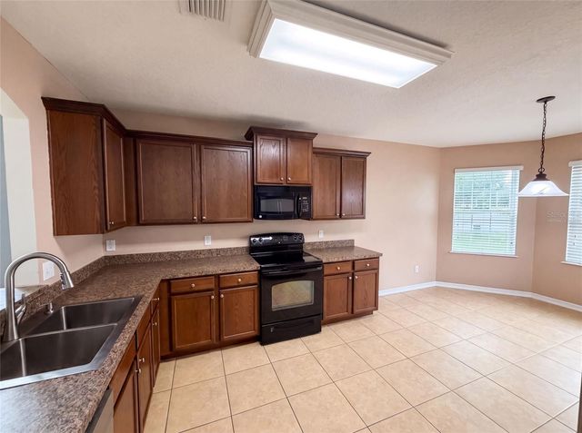 12902 SCOUT COURT, Grand Island, FL 32735