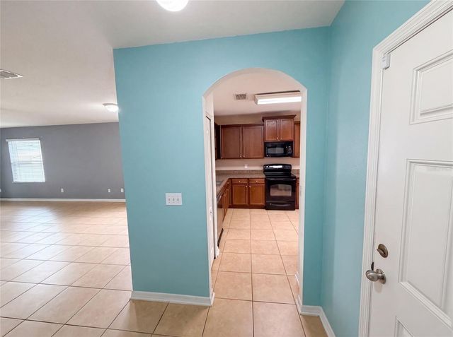 12902 SCOUT COURT, Grand Island, FL 32735
