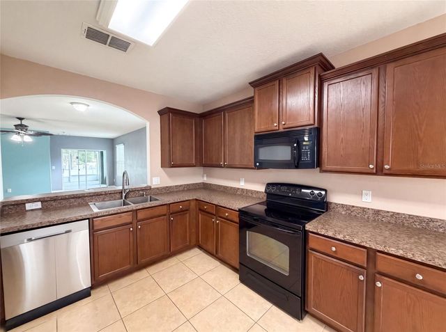 12902 SCOUT COURT, Grand Island, FL 32735