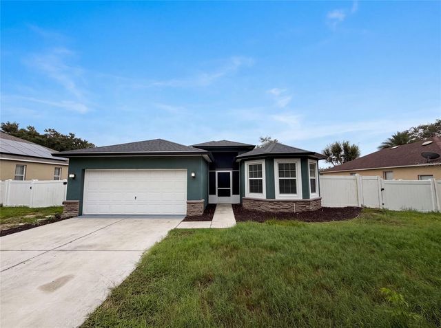 12902 SCOUT COURT, Grand Island, FL 32735