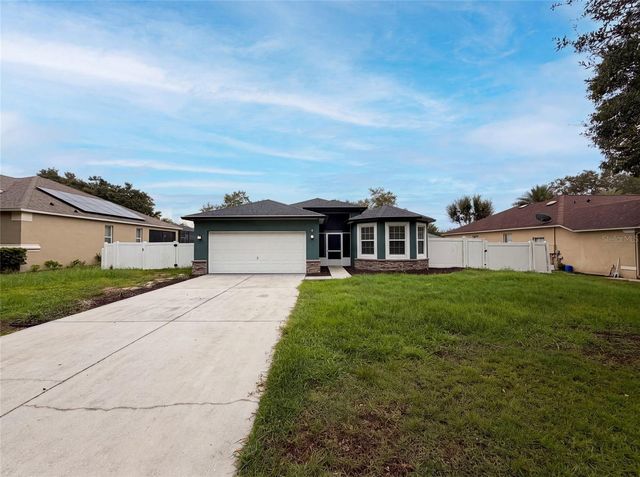 12902 SCOUT COURT, Grand Island, FL 32735