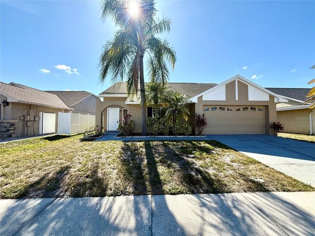 7048 HOLLOWELL DRIVE, Tampa, FL 33634