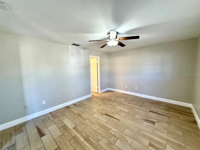 7048 HOLLOWELL DRIVE, Tampa, FL 33634