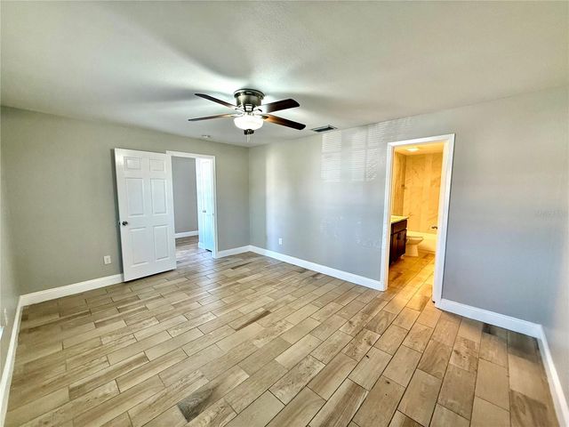7048 HOLLOWELL DRIVE, Tampa, FL 33634