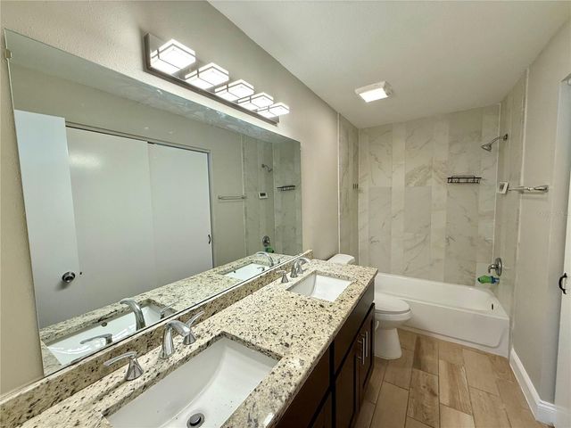 7048 HOLLOWELL DRIVE, Tampa, FL 33634