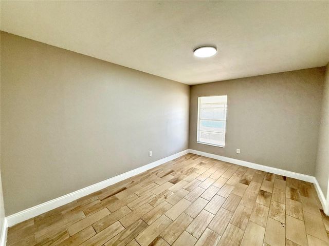 7048 HOLLOWELL DRIVE, Tampa, FL 33634