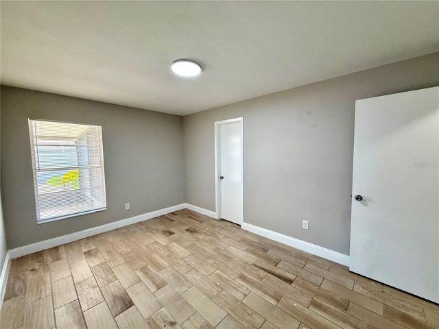 7048 HOLLOWELL DRIVE, Tampa, FL 33634