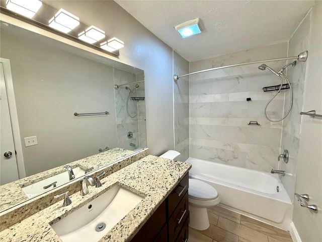 7048 HOLLOWELL DRIVE, Tampa, FL 33634