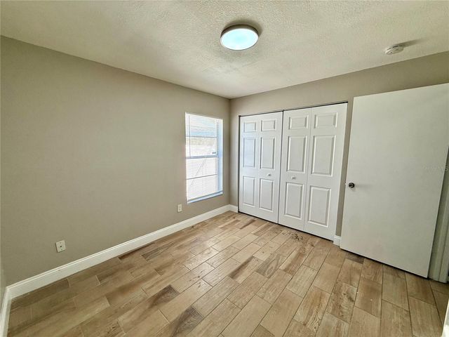 7048 HOLLOWELL DRIVE, Tampa, FL 33634