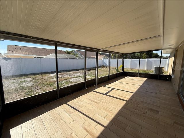 7048 HOLLOWELL DRIVE, Tampa, FL 33634