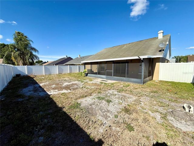 7048 HOLLOWELL DRIVE, Tampa, FL 33634