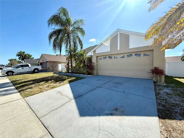 7048 HOLLOWELL DRIVE, Tampa, FL 33634