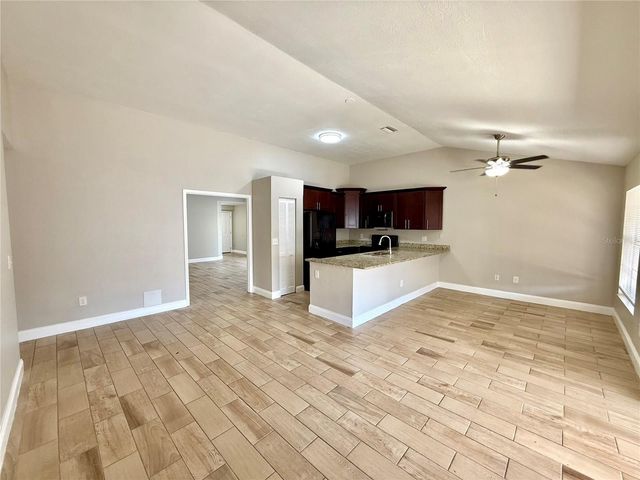 7048 HOLLOWELL DRIVE, Tampa, FL 33634