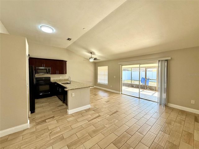 7048 HOLLOWELL DRIVE, Tampa, FL 33634