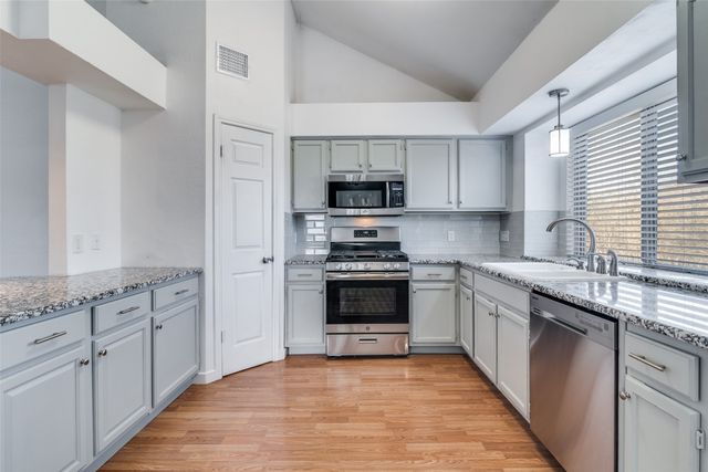 8122 Blackfin Drive, Rowlett, TX 75089