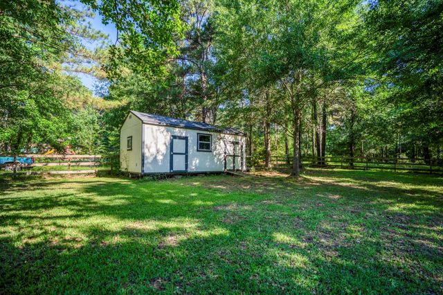13351 Hidden Manor Court, Willis, TX 77318