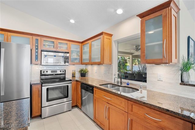 10249 Boca CIR, Naples, FL 34109