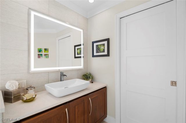 10249 Boca CIR, Naples, FL 34109