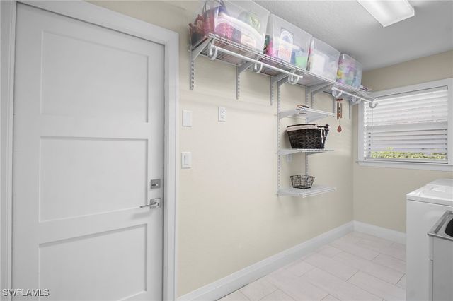 10249 Boca CIR, Naples, FL 34109