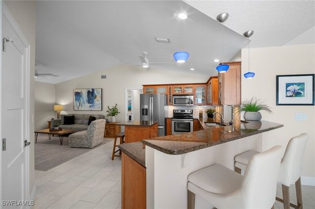 10249 Boca CIR, Naples, FL 34109