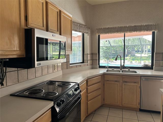 1418 HOUNDS HOLLOW COURT, Lutz, FL 33549